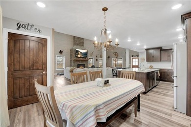 This expansive residence in Warsaw, MO, offers a harmonious - photo 30