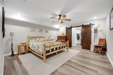 This expansive residence in Warsaw, MO, offers a harmonious - photo 37