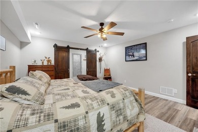 This expansive residence in Warsaw, MO, offers a harmonious - photo 38