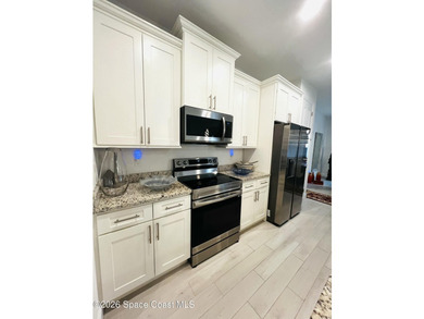 Custom-built in 2022, this beautifully designed 3-bedroom - photo 9