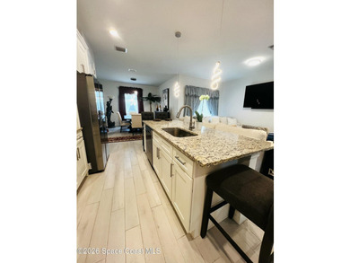 Custom-built in 2022, this beautifully designed 3-bedroom - photo 10