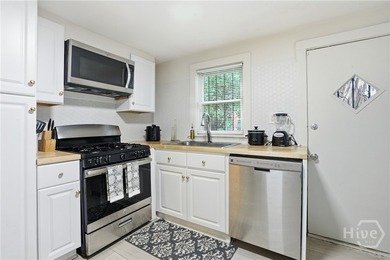 This well-maintained 3-bedroom, 1-bath block home offers - photo 11