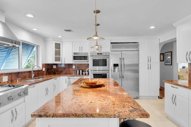 Welcome to this spacious canal-front retreat set on an oversized - photo 18
