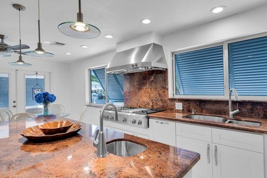 Welcome to this spacious canal-front retreat set on an oversized - photo 20