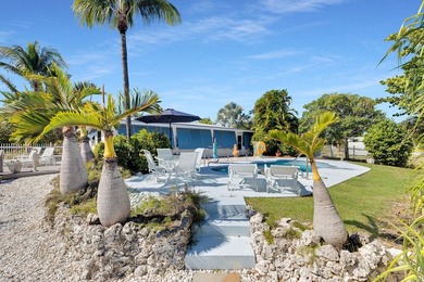 Welcome to this spacious canal-front retreat set on an oversized - photo 30
