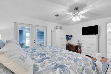 Welcome to this spacious canal-front retreat set on an oversized - photo 37