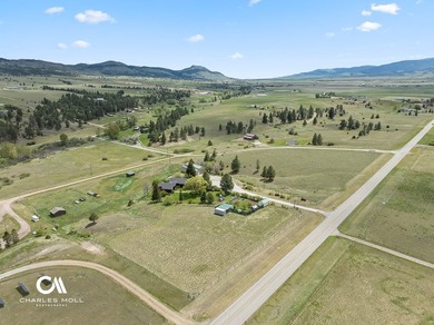 Set against 10+ acres with sweeping Montana views, this - photo 4