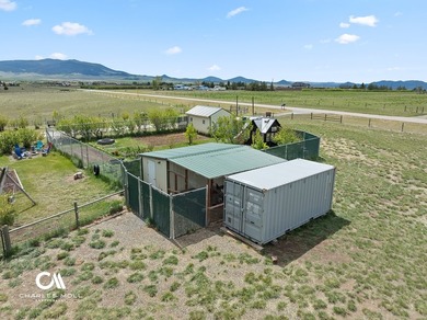 Set against 10+ acres with sweeping Montana views, this - photo 8