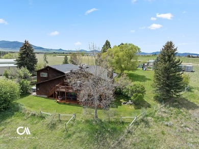 Set against 10+ acres with sweeping Montana views, this - photo 10