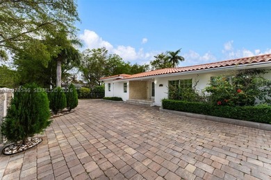 Welcome to 400 SW 24th Road, nestled on a quiet street in one of - photo 1