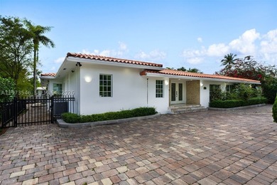 Welcome to 400 SW 24th Road, nestled on a quiet street in one of - photo 2