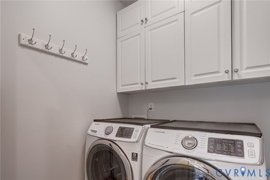 Welcome to this beautifully maintained brick-front home in the - photo 28