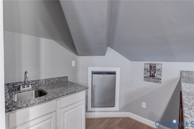 Welcome to this beautifully maintained brick-front home in the - photo 40