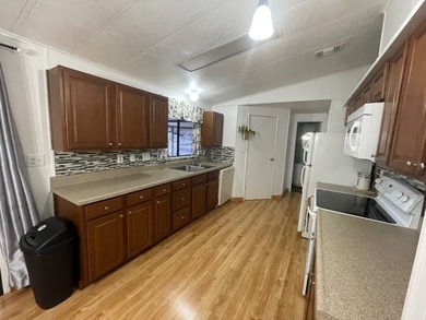 Extremely well maintained Palm Harbor Home with popular split - photo 10