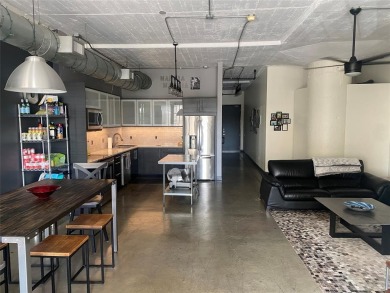 PRICED TO SELL! Welcome to Soco Urban Lofts, where historic