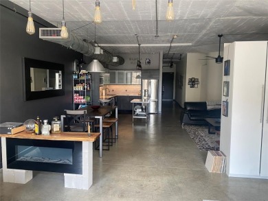 PRICED TO SELL! Welcome to Soco Urban Lofts, where historic