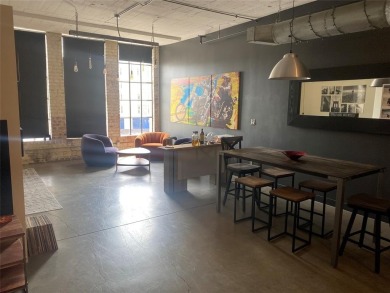 PRICED TO SELL! Welcome to Soco Urban Lofts, where historic