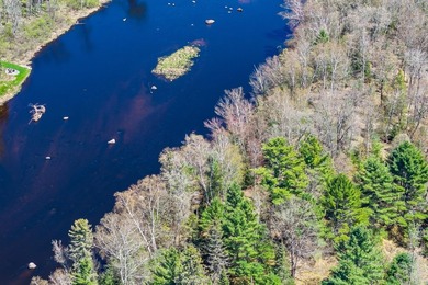 This 1.16-acre wooded parcel with 210 feet of frontage on the - photo 11