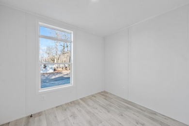 CONVENIENTLY LOCATED, COZY AND AFFORDABLE NEW HOME. Featuring an - photo 21