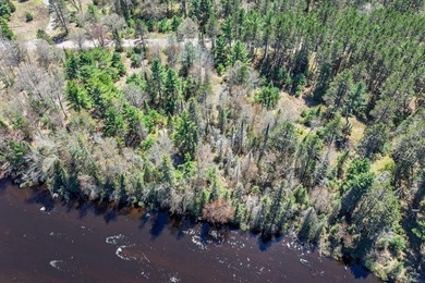 This 1.16-acre wooded parcel with 210 feet of frontage on the - photo 22