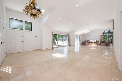 Welcome to this sprawling sunlit ranch with vaulted ceilings and - photo 5