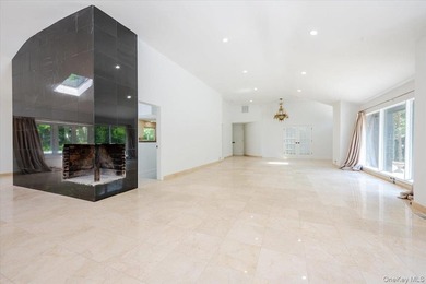 Welcome to this sprawling sunlit ranch with vaulted ceilings and - photo 6