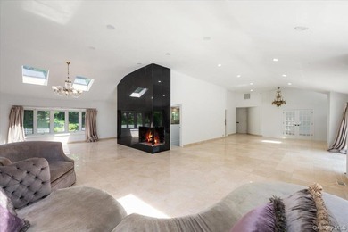 Welcome to this sprawling sunlit ranch with vaulted ceilings and - photo 8