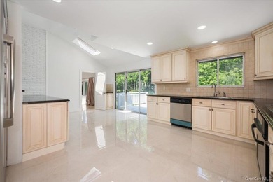 Welcome to this sprawling sunlit ranch with vaulted ceilings and - photo 10