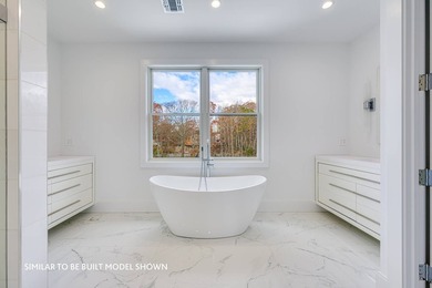Just minutes from the heart of Montauk, this new construction - photo 17