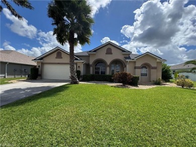 Lake Home For Sale in Lehigh Acres, Florida
