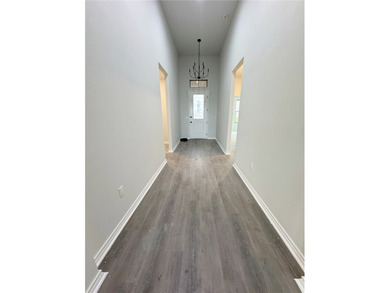 Welcome to this stunning 4-bedroom, 3-bathroom home located in - photo 3