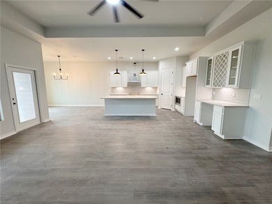 Welcome to this stunning 4-bedroom, 3-bathroom home located in - photo 7