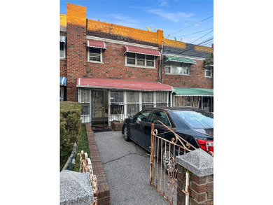 Welcome to this exceptional two-family home in the heart of the - photo 1