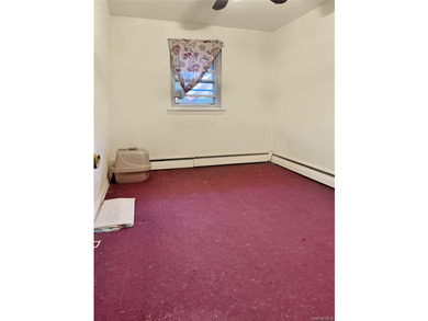 Welcome to this exceptional two-family home in the heart of the - photo 3