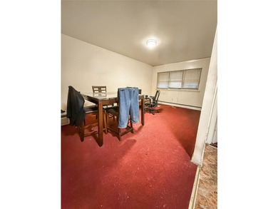 Welcome to this exceptional two-family home in the heart of the - photo 6