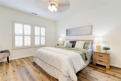 RARE DUAL PRIMARY LAYOUT! Welcome to effortless luxury living in - photo 15