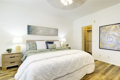 RARE DUAL PRIMARY LAYOUT! Welcome to effortless luxury living in - photo 16