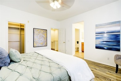 RARE DUAL PRIMARY LAYOUT! Welcome to effortless luxury living in - photo 17