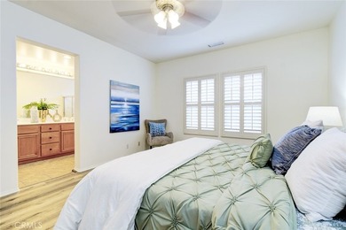 RARE DUAL PRIMARY LAYOUT! Welcome to effortless luxury living in - photo 19