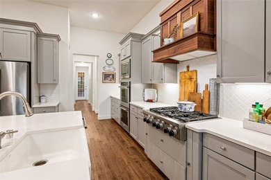 Situated on a premier corner lot in the highly sought-after - photo 19