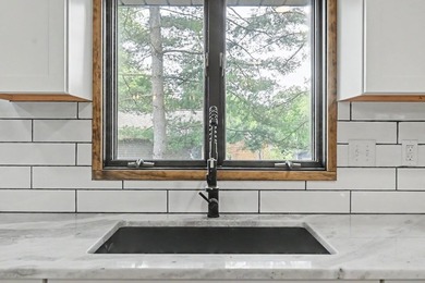Beautifully renovated home near Charles Mill Lake! This - photo 10