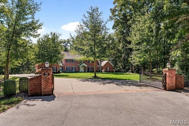 Nestled on over 12 private acres of rolling hills and lush - photo 2