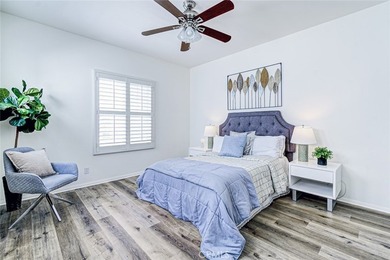 RARE DUAL PRIMARY LAYOUT! Welcome to effortless luxury living in - photo 22