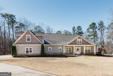 Lake Home For Sale in Meansville, Georgia