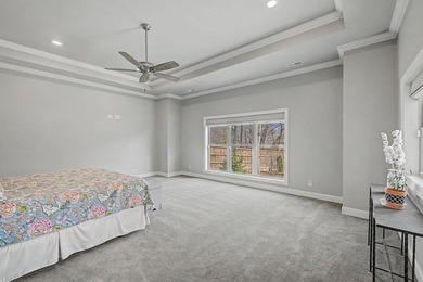 Step into this custom English-inspired one-level home, nestled - photo 31