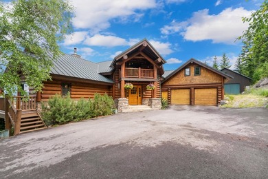Located at the end of the road, this custom log home is perched - photo 3