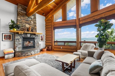 Located at the end of the road, this custom log home is perched - photo 5