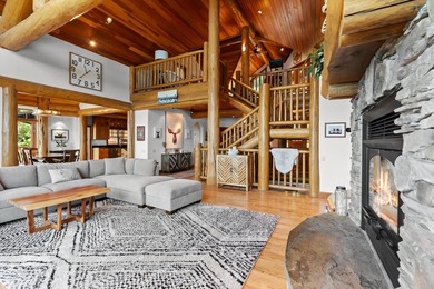 Located at the end of the road, this custom log home is perched - photo 7