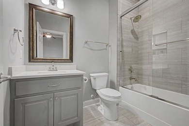Step into this custom English-inspired one-level home, nestled - photo 38