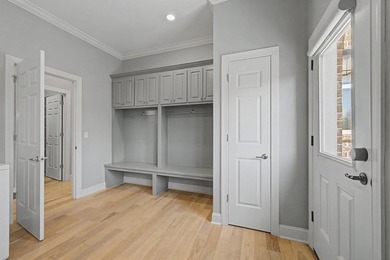Step into this custom English-inspired one-level home, nestled - photo 43